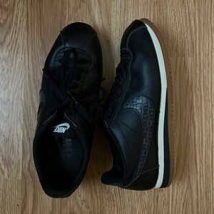 Size 7 black Nike Cortez sneakers